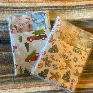 Kohl’s Christmas Vinyl/Flannel back Tablecloths, set of 2